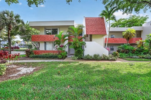 Photo of 823 Cypress Blvd #104, Pompano Beach, FL 33069 (MLS # A11999077)