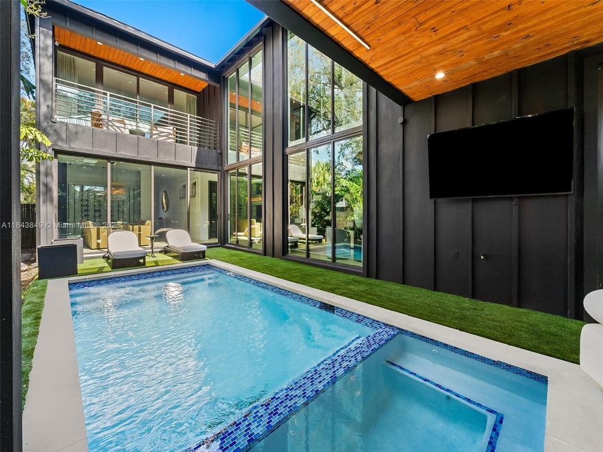WELCOME HOME! A beautiful modern new construction home in the charming Victoria Park, offers 5 bedrooms, each with an en-suite bathroom, plus an office / game room. This luxury home comes fully furnished with high-end appliances and fixtures. A culinary gourmet kitchen with large center island overlooking the pool area, floor to ceiling windows & multiple doorways blending indoor & outdoor tropical living. A big formal dinning area with a glass wine room. 2 masters with covered balconies. Outdoor sitting area with a heated pool, and a waterfall cascade from the ceiling of the covered balcony into the pool. Full laundry room, 2 car garage. Located just minutes away from Las Olas Blvd, shopping centers, Ft Laud beach, and a short drive to the airport.