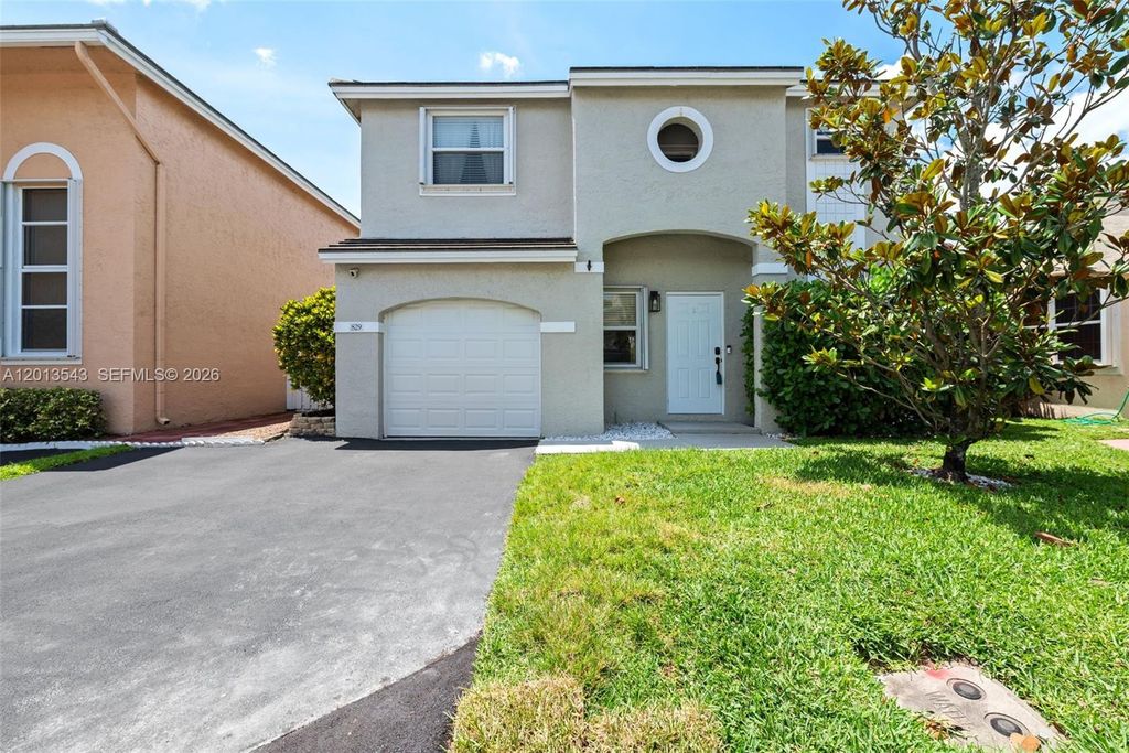 Photo of 829 NW 99th Ave, Plantation, FL 33324 (MLS # A12013543)
