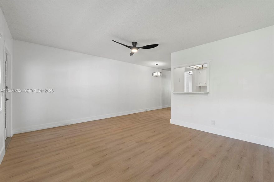 Welcome to Century Village! Spacious 1 bedroom 1 bath unit. New Modern Luxury Vinyl flooring through out(waterproof), freshly painted. Located on the second floor, conveniently next door to laundry room, storage room and Hoyer lift(you'll never have to use the stairs if you don't wish to). Resort Style Living In 55+ Community! Indoor and outdoor pools, clubhouse, tennis, pickleball, ping pong, billiard, mini golf, exercise facility. Cable, Water, Sewer and Trash are included in Condo Fees. HOA Fees: Seacrest: $233.24 CVE Master Management: $185.00 and CenClub: $120.00 No Rentals.