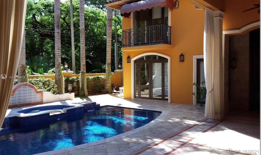 Elegant Villa situated on a beautiful tree-lined cul-de-sac in the heart of Coconut Grove. Step into a stunning  courtyard with an expansive outdoor terrace overlooking the pool, perfect for entertaining.  Enjoy Five beds, five / two baths including detached 400 SqFt office with private entrance plus additional detached guesthouse. Oversize kitchen with cooking island, subzero appliances and 192 bottle wine cooler is an epicurean delight. Soaring volume ceilings, marble and wood floors, custom cabinetry and woodwork give the perfect balance of luxury and contemporary elegance. Parking for six cars and walking distance to Miami's best private schools and Coconut Grove restaurants complete this rare South Grove opportunity.