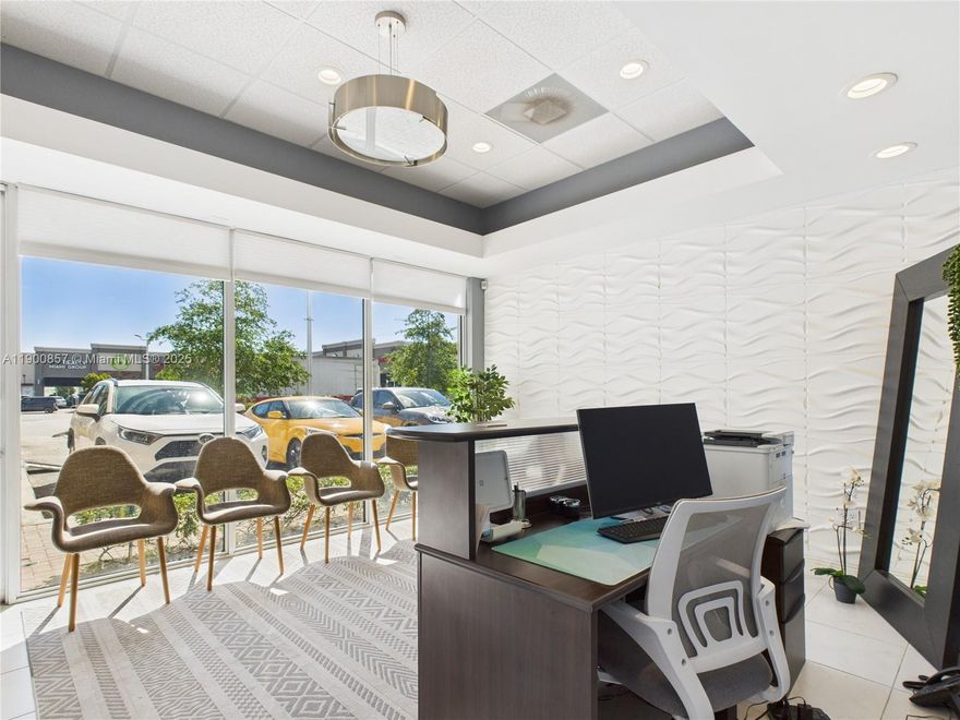 PRICE IMPROVEMENT! Prime commercial sublease ideal for medical, office, or professional use in the heart of Hallandale Beach. Suite 104 offers a furnished reception area, ADA-compliant restroom, and three spacious private rooms, each equipped with sinks. A shared staff kitchen includes a full-size refrigerator/freezer, microwave, and coffee machine. The suite features floor-to-ceiling windows, ground-level access, and independent A/C zones for comfort and functionality. Move-in ready and perfectly suited for a variety of professional uses.  $3,500/month with utilities not included (separate meter from STE 105)