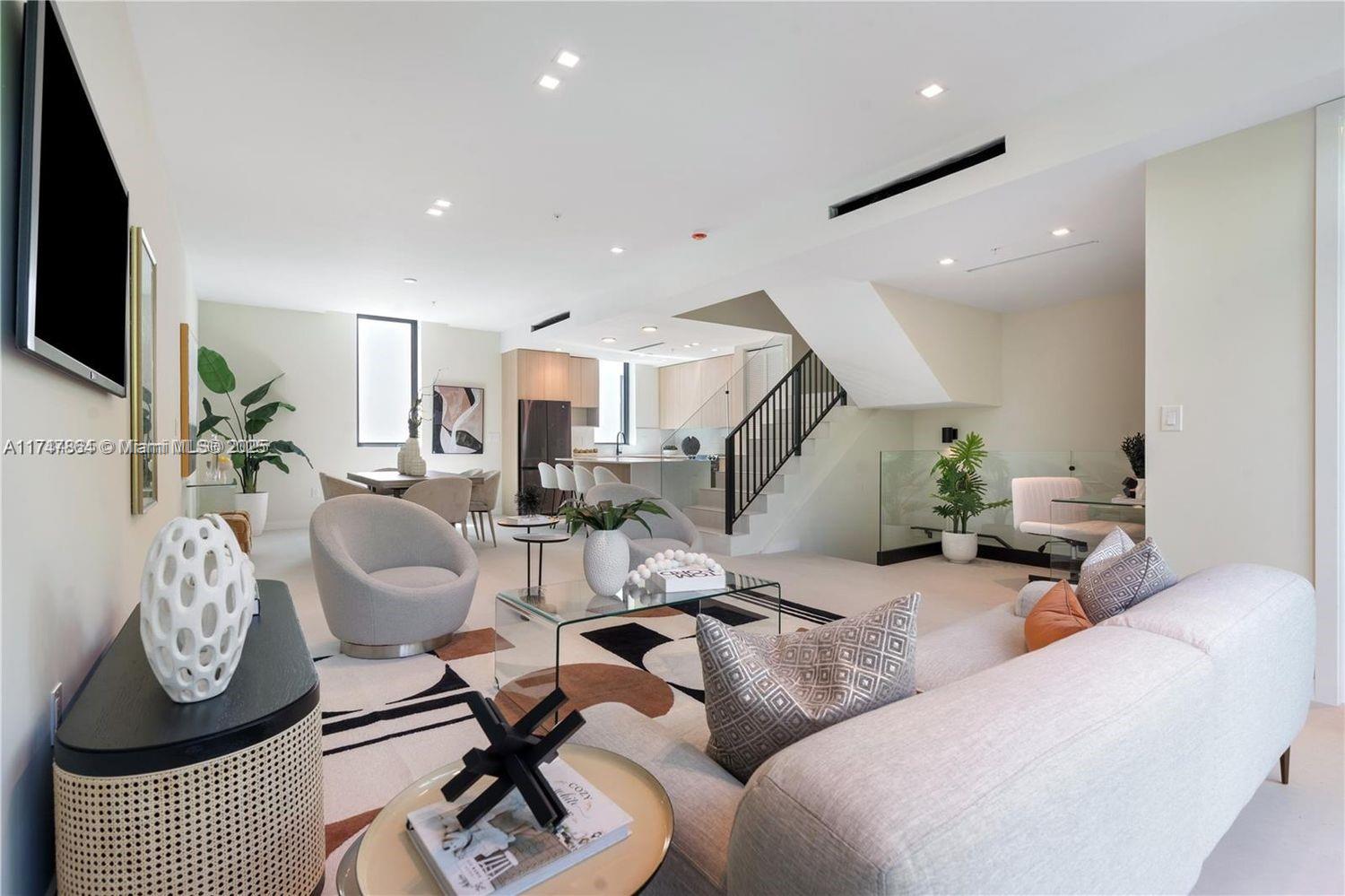 Discover the ultimate in contemporary living in this exquisite 3-story townhome featuring 3 bedrooms and 3bathrooms. The sleek, modern design offers a seamless blend of style and functionality, complete with an open-concept layout and a private rooftop terrace. Ideally located in Silver Grove, just steps from Grove Central Station,with easy access to the University of Miami, Brickell, and Miami International Airport.Whether you're looking forthe perfect home or purchasing as an investment, this townhome is an exceptional opportunity. Schedule yourprivate tour today to experience the future of urban living