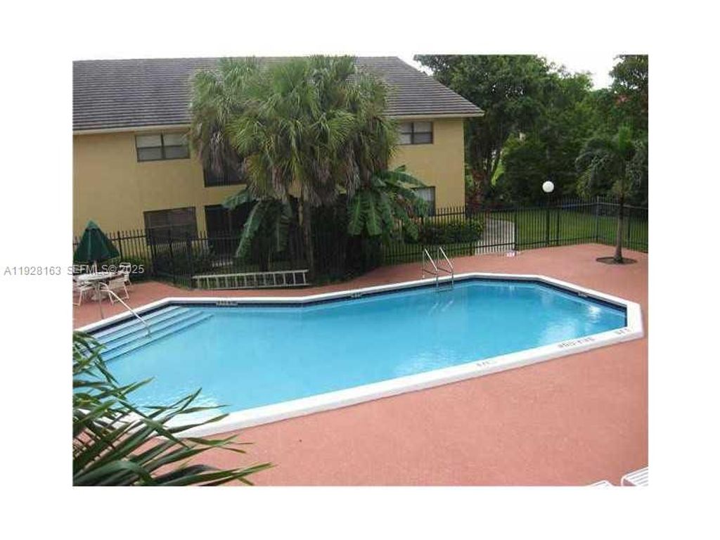 Photo of 2997 Riverside Dr #212, Coral Springs, FL 33065 (MLS # A11928163)