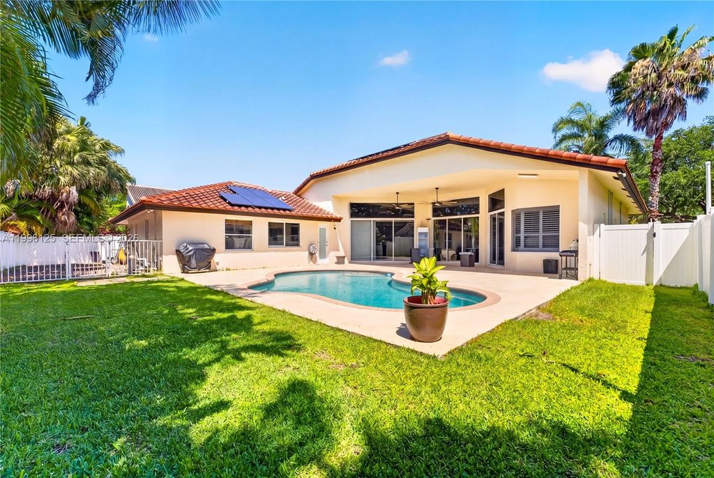 Photo of 9836 NW 48th Ct, Coral Springs, FL 33076 (MLS # A11996125)