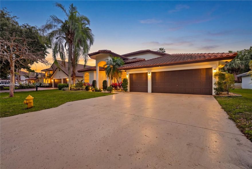 Welcome to this stunning one-story 4-bedroom, 2.5-bath home with pool located in the highly sought-after North Springs community in Coral Springs. NO HOA. Enter through grand Impact double doors into a bright and spacious layout featuring vinyl flooring, in main living and dining areas.  The remodeled kitchen is a true centerpiece, complete with stainless steel appliances, granite countertops, and a versatile den/office space just off to the side. The laundry room is conveniently located off the kitchen and equipped with a top-of-the-line front-loading washer and dryer. Tastefully updated guest bath.The primary suite offers a spa-like retreat with a soaking tub, separate walk-in shower, and dual vanities. Updated Cabana bath with impact door. Step outside to a large, fenced backyard designed for entertaining, featuring a free-form pool with child safety gate, open patio, and plenty of space to enjoy South Florida living. Additional highlights include a 2018 roof and a converted garage for added flexibility. A top-of-the-line solar panel system installed, helping to significantly reduce and potentially fully cover your electric bill. Ideally located and zoned for great schools.