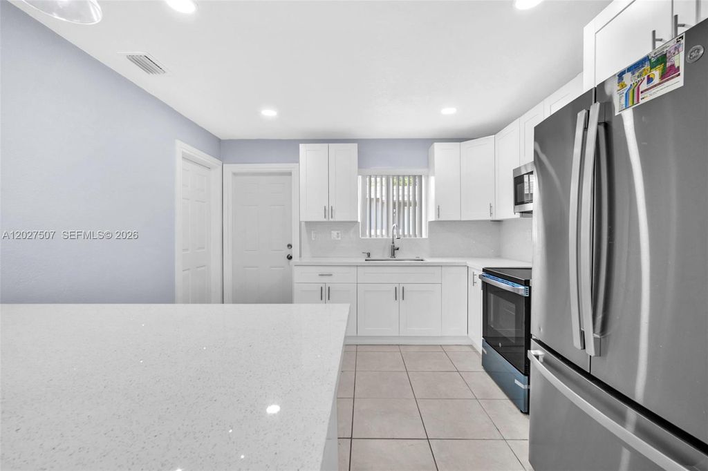 Photo of 357 Phippen Waiters Rd #1-2, Dania Beach, FL 33004 (MLS # A12027507)