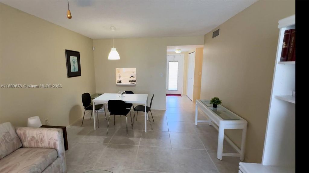 Photo of 8280 Sunrise Lakes Blvd #205, Sunrise, FL 33322 (MLS # A11899878)