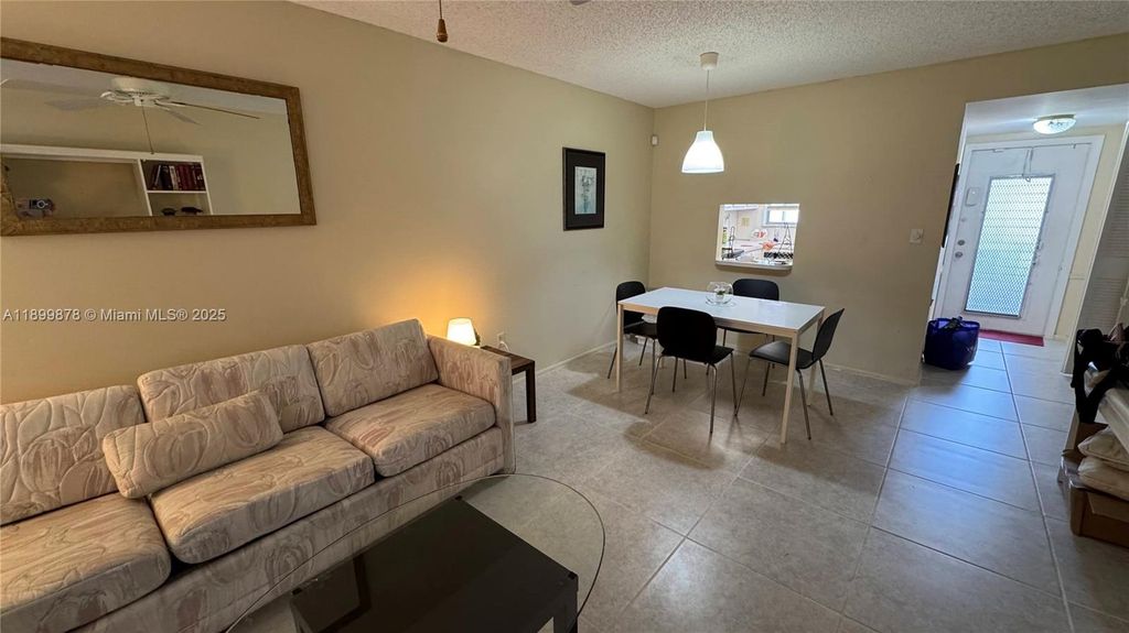 Photo of 8280 Sunrise Lakes Blvd #205, Sunrise, FL 33322 (MLS # A11899878)