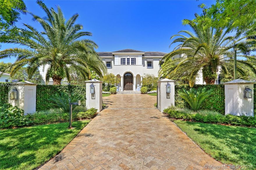 Elegance defines this home on the prettiest cul-de-sac street in Pinecrest!  Built in 2003 and recently renovated, this 7 Br/8.5 Ba property is a show stopper!  Jerusalem tile drive, pristinely manicured gardens, covered patio with summer kitchen, electric screens and exquisite pool area create the backdrop for the grandeur that awayis inside.  Gracious foyer, coffered ceilings, marble floors, impact windows and doors with transom windows above, new movie theater, gorgeous kitchen with new top of the line appliances, and truly too much to mention!