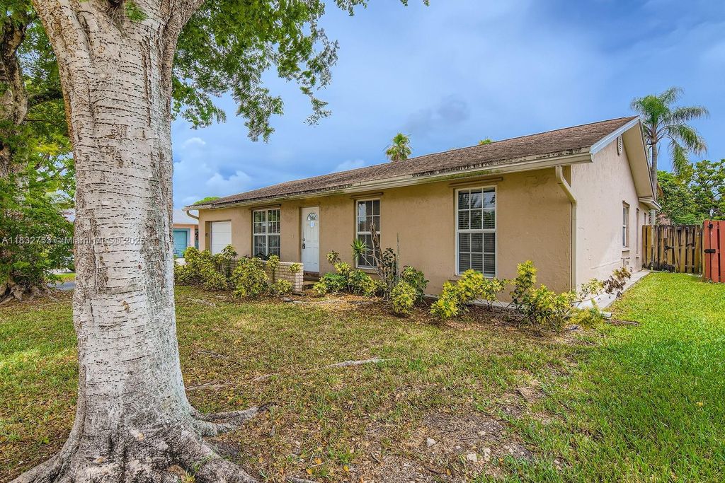 Photo of 11035 NW 27th St, Sunrise, FL 33322 (MLS # A11832753)