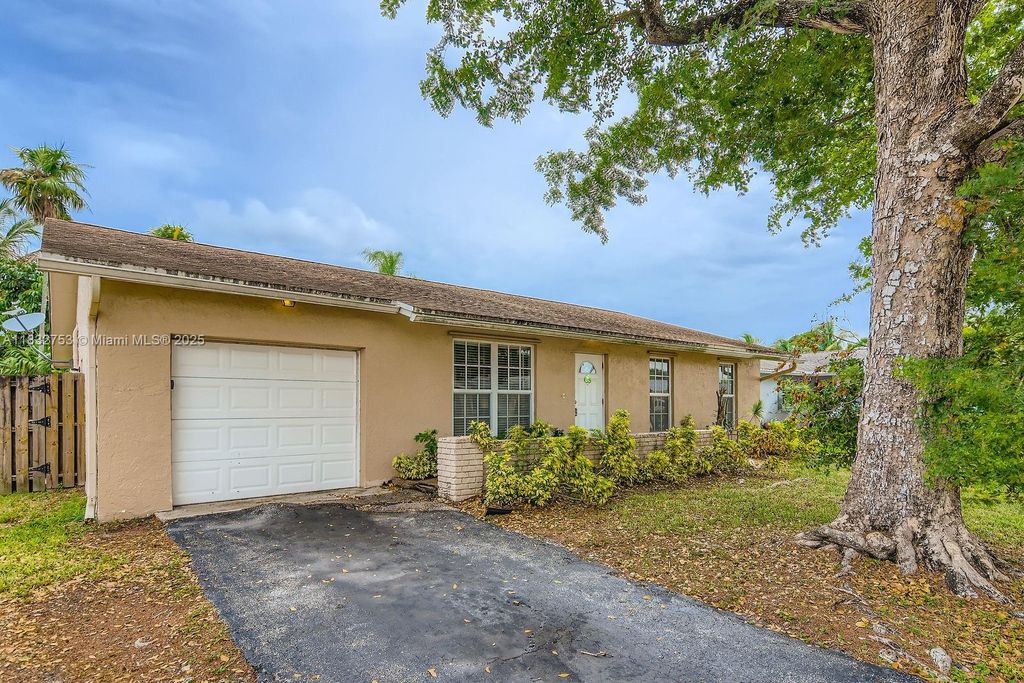 Photo of 11035 NW 27th St, Sunrise, FL 33322 (MLS # A11832753)