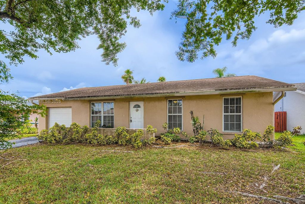 Photo of 11035 NW 27th St, Sunrise, FL 33322 (MLS # A11832753)