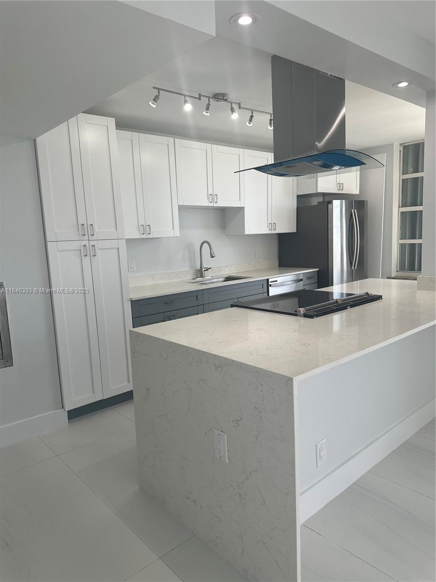 Experience luxury coastal living in this beautifully remodeled 2-bedroom, 2-bathroom apartment offering breathtaking ocean views. Thoughtfully designed with modern finishes, this unit features a spacious open-concept layout, floor-t0-ceiling windows and a private balcony perfect for relaxing while enjoying the sea breeze. The kitchen with quartz countertops and stainless steel appliances.The primary suite with walk inn closet and a nice modern bathroom.The second bedroom offers flexibility for guests or a home office with an adjacent bathroom.Porcelain tiles floors throughout, washer/dryer in-unit and ample storage space.Located in a great building with resort style amenities-pool,gym,24/7 security and direct beach access.Move-in ready and ideal for year-round living or a vacation escape.