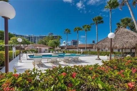 ENJOY OPEN CONCEPT LIVING IN THS GEROGEOUS TOWNHOME IN THE HEART OF THREE ISLAND HALLANDALE FEATURING three bedroom/two bathrooms. Newly renovated with soaring ceilings with natural wood and private patio. Enjoy vaulted ceilings, wood beams, skylights. Pet friendly.
Amenities include: pool, picnic area, tennis court, boating, basketball, marina
