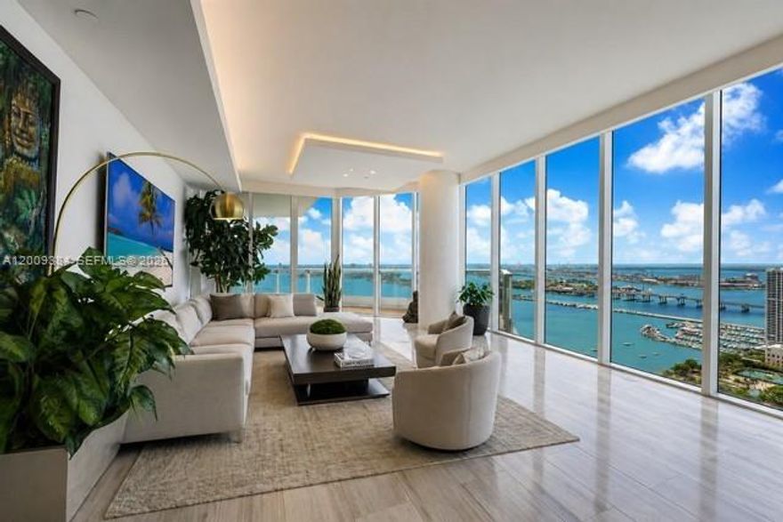 Beautifully upgraded, reconfigured 4-bedroom residence at Paramount Bay with unobstructed views of Biscayne Bay, the Atlantic Ocean, the skyline, and Port of Miami. This high-floor home features floor-to-ceiling impact glass, a spacious private terrace, and a split layout with bright living and dining areas. The open chef’s kitchen includes premium appliances, custom cabinetry, and stone countertops. All bedrooms are private ensuites with terraces with the exception of one. The primary suite offers a spa-like bath and ample built in closets. Paramount Bay features concierge, valet, fitness center, spa, and resort-style pools. Prime Edgewater location near parks, shopping, dining, and top Miami destinations. A truly unique opportunity to secure a high-floor residence that defines sophisticated Miami waterfront living.
