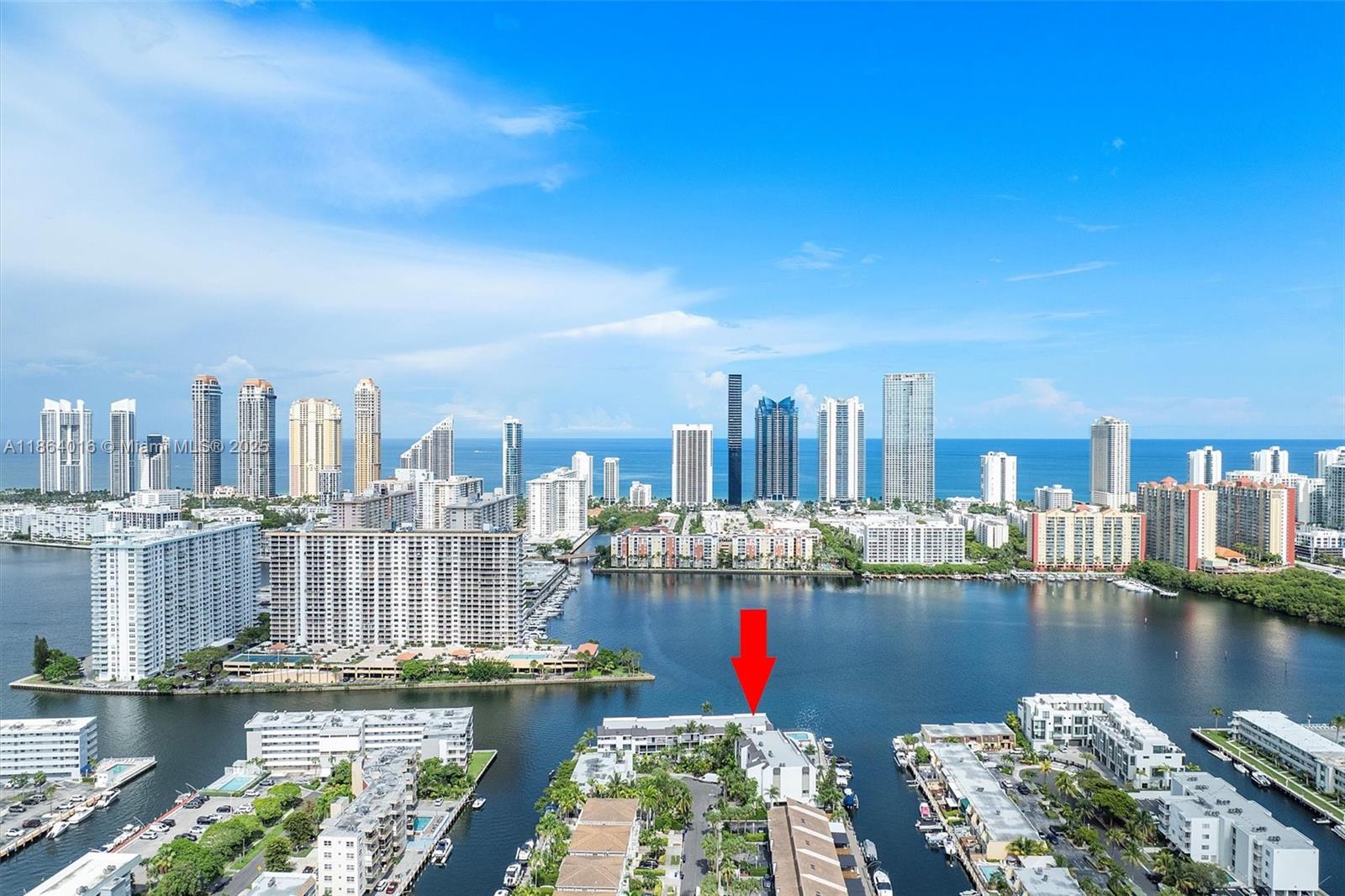 Welcome to this spacious 2-bedroom, 2-bath waterfront penthouse, rarely available, with stunning views in exclusive Eastern Shores. Located at 4000 NE 168th St, North Miami Beach, this residence offers 1,397 sq. ft. of well-appointed living space enhanced by tile flooring, central air, and an in-unit washer/dryer. Community amenities include a heated pool, sauna/spa, gym, billiards, media room, barbecue area, and gazebo, while additional conveniences such as elevator access, assigned garage parking, and guest spaces complete the experience. This property seamlessly blends comfort, functionality, and a luxury lifestyle, providing an exceptional opportunity to enjoy waterfront living in a prime setting.