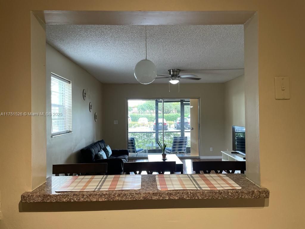 Photo of 4167 NW 90th Ave #101, Coral Springs, FL 33065 (MLS # A11751526)