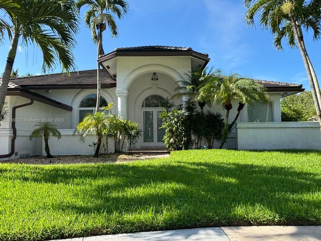 Photo of 320 Windmill Palm Ave, Plantation, FL 33324 (MLS # A11789721)