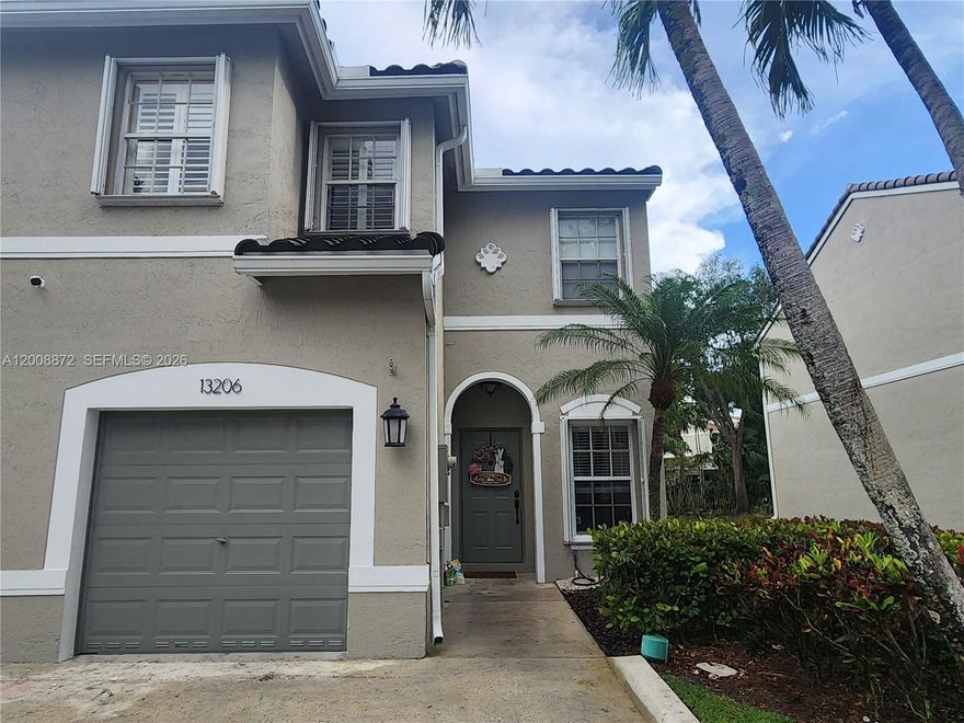 Spacious 3 bedroom 2.5 bath Corner home with 1 car attached garage in the charming community of Plantation Trace. This bright and spacious townhome has an open concept, beautifully designed plan. Features include Gourmet kitchen with Wood Cabinets and granite counters.  Stainless Appliances (2023) exterior ac handler (2025), water heater (2021), travertine tile throughout the downstairs, laminate on stairs and upstairs. All bedrooms upstairs. Spacious primary bed has large walk-in closet, Primary bath has been updated with dual sinks, soaking tub and separate shower. other features include: new roof (2025) accordion hurricane protection, entertainment area with wine cooler, all baths remodeled, full sized washer/dryer, updating plumbing & light fixtures and ceiling fans.  Unit backs up to beautiful water and golf course view which you can  enjoy on your back patio. Attached garage with 2 car driveway.  Plantation Trace has community pool and tot lot. It is perfectly located 
within a short distance of Sawgrass Elementary, as well as Flamingo Park with covered outdoor basketball courts, baseball and soccer fields, a splash pad, and a pathway. Located near Sawgrass Expressway, I-75, and I-595 for easy commute in any direction. Only 20-25 min. drive to FLL International Airport and beaches. Close to Sawgrass mall w/dining and shopping options. Low Assoc fees. No credit or income requirements