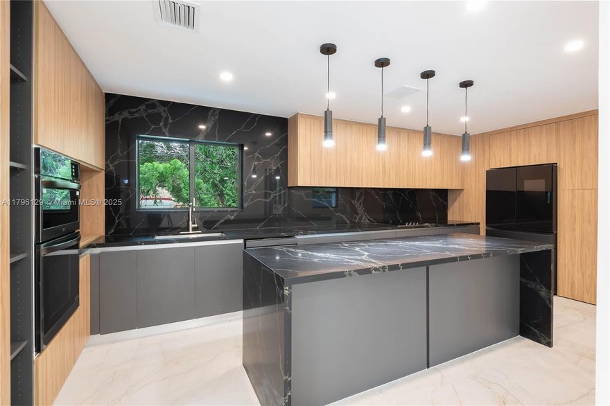 Stunning Fully renovated Home in prime Miami Location, just minutes from Brickell, Coconut Grove, Coral Gables and Miami International Airport.
Beautifully, and completely remodeled modern home with 3 bedroom, and 3 bathroom. One bedroom/bathroom with an independent entrance to be used as part of the house or as an income producer. Featuring a spacious open concept layout. The heart of the house is a spectacular kitchen with high-end finishes and an open layout perfect for hosting friends and family.
Enjoy a large backyard with room to build your dream pool, and the shade and beauty of a mango tree, impact windows, roof from 2023.
This home offers both convenience and luxury living.  Don't miss this exceptional opportunity in one of Miami's most desirable areas!!!