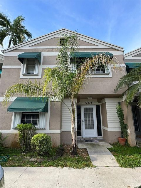 Photo of 12378 SW 52nd Ct #12378, Cooper City, FL 33330 (MLS # A11642559)