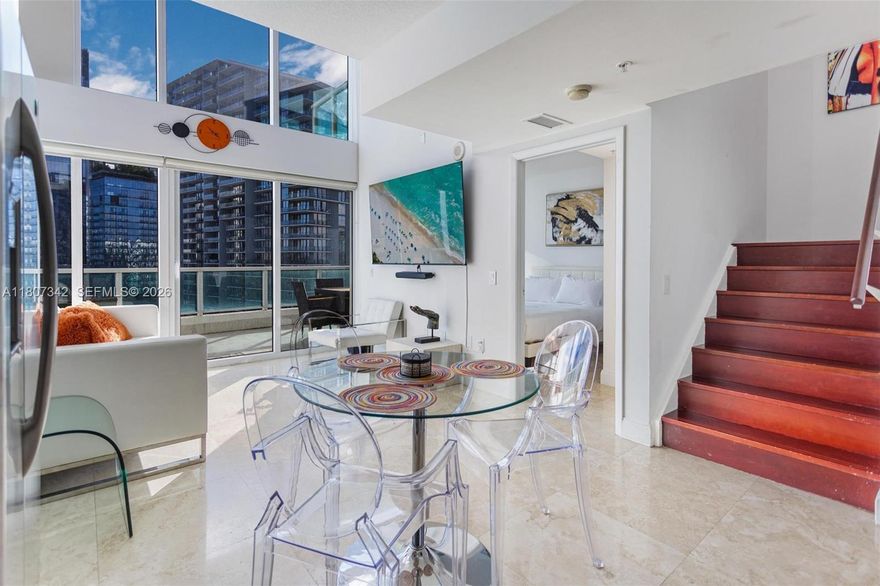 LUXURY LOFT in the HEART OF BRICKELL, MIAMI with UNOBSTRUCTED VIEWS, 2 GARAGE PARKING SPOTS, EXTRA LARGE TERRACE! 2 bd/2bth +Den/Office. Brickell's BEST location 5 Min walk to the HOTTEST restaurants, lounges and nightlife. High on the 20th floor with stunning UNOBSTRUCTED VIEWS OF THE CITY! Top luxury amenities: 24h security, modern lobby, TWO GARAGE PARKING SPOTS, pool, two-story gym, locker rooms, men/women sauna/steam/jacuzzi. High ceilings, excellent finishes, modern artwork, walk-in closet, storage. This IS the best of Miami! MOVE-IN READY - Can be sold fully furnished! ATTENTION INVESTORS: 30+ day rentals allowed - generates 60k+ per year! Brickell is the HOTTEST area in Miami with steps to nightlife, restaurants, entertainment. You Have To See This Spot!