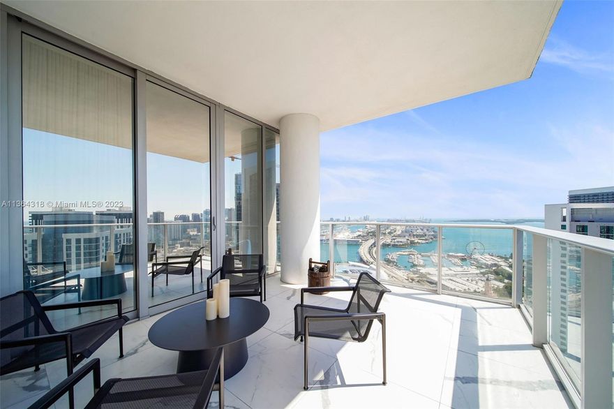 Live like a STAR! Exclusive poolside cabana included!! Where beautiful condos meet resort-style amenities - Paramount Worldcenter has redefined luxury living in Miami in a thriving, energetic neighborhood. This is the NEW Miami. This turnkey opportunity offers the glam life with soul-nurturing water views and plenty of living space. Enjoy water-facing sunrises and city-lit sunsets on a huge corner balcony that is another functional living space. Den adjacent to foyer. Impeccably maintained residence in the best line! $83k of designer upgrades! Go downstairs and play tennis, basketball, soccer and more. Enjoy the resort-style pools with your own private air-conditioned cabana w/kitchenette, full bath, private turfed garden and al fresco rooftop – true VIP status!