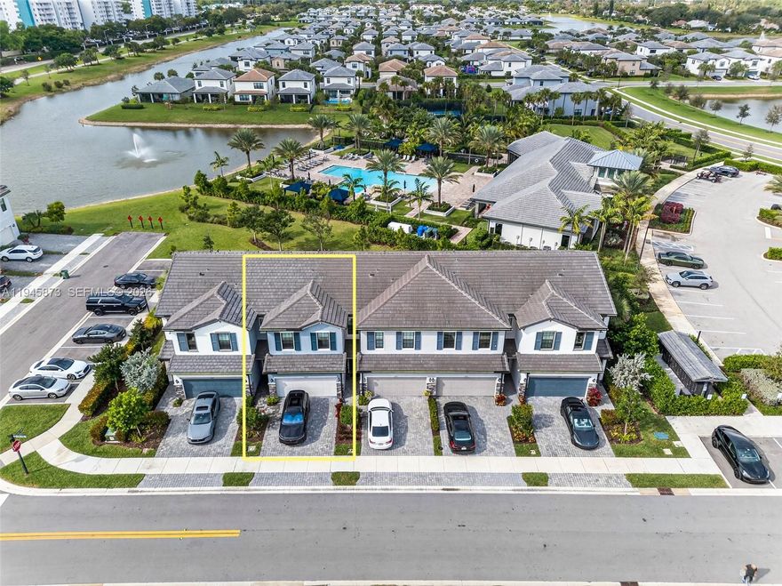 This is a must see! Modern 3-bedroom, 2.5-bath, 2-car garage townhouse located in the highly desirable, gated Oak Tree community. This open concept home features an oversized kitchen island, 42" cabinets, Zeus quartz countertops, blackout and motorized shades, a dimming light system, extra-wide upstairs hallway, Google Home system, upgraded thermostat, and upgraded garage door motor. The laundry room is conveniently located upstairs and includes a built-in sink area. Basic cable, internet, and trash pickup are included in the maintenance fee. Community amenities are just steps away and include a pool, gym, community room, dog park, and pickleball courts. Enjoy serene lake views from the back patio, all impact windows and doors, and a truly move-in-ready residence.