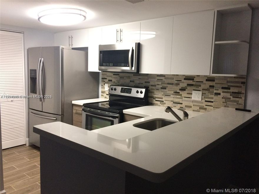 Unit with stainless steel appliances and quartz countertops. Bathrooms with spa shower and custom vanity. First floor unit, feels like a house. Complex with lots of amenities including pool, BBQ area, tennis court, exercise room. Located close to "A" rated schools, Sawgrass Mall, Broward Mall and majors highways I-595, I-75.