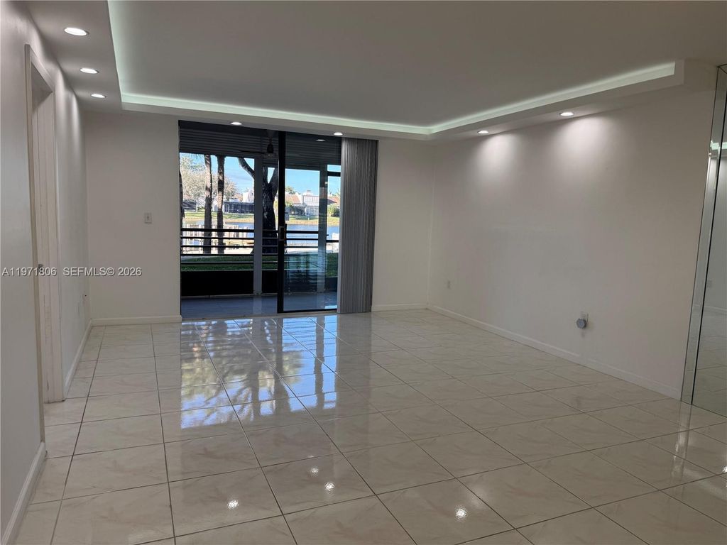 Photo of 1101 Colony Point Cir #102, Pembroke Pines, FL 33026 (MLS # A11971806)