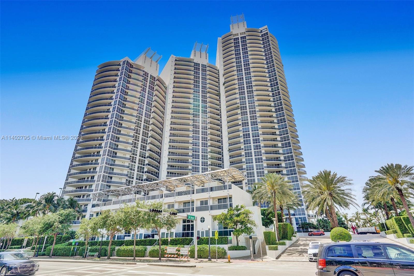 Enjoy this sought after corner, spacious 2 Bed, 2 Bath with 2 terraces, split floorplan, tile and wood floors, custom closets and electric window shades in bedrooms. This fully furnished apartment has a great spacious layout with an open kitchen and large living area opening up to your spacious terrace with ocean and city views. Murano Grande is one of the most sought-after buildings in South of Fifth offering 5-star amenities on a scenic Bayfront location, including tennis court, updated large pool deck, 24-hour valet and security. Easy to show. Call today.