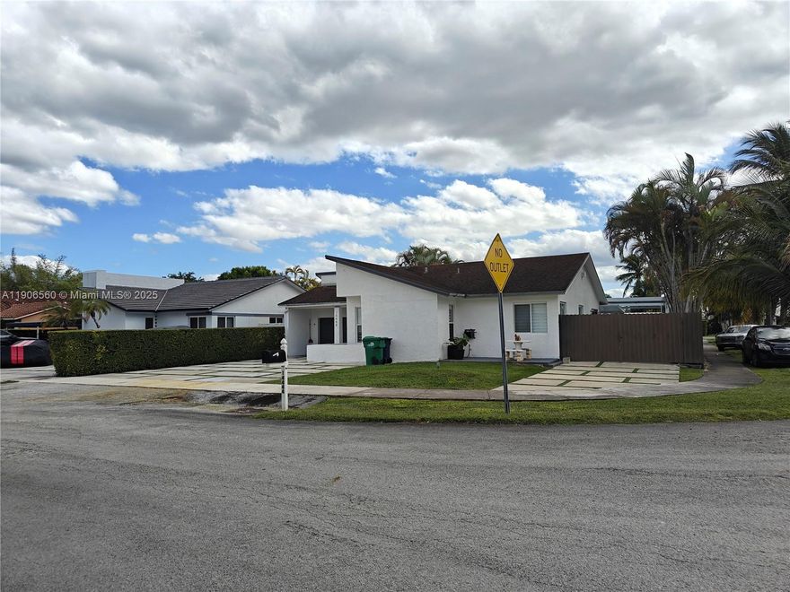 WELCOME TO THIS CORNER POOL HOME OASIS ON LARGE LOT WITH NO HOA! LOCATED ON A DEAD END WITH MINIMAL TRAFFIC. PERFECT FOR ENTERTAINING OR RELAXING. MANY UPGRADES. INTERIOR FLOORING CONSISTS OF WHITE OVERSIZED MARBLE TILES THROUGHOUT. RECESSED LIGHTING, ALARM/CAMERA SYSTEM. KITCHEN HAS WHITE CABINETS THAT EXTEND TO CEILING AND NEW STAINLESS STEEL APPLIANCES. KITCHEN ISLAND WITH WITH WINE COOLER. EXTERIOR PROPERTY FEATURES: POOL WAS RECENTLY DONE. TURKISH EXTERIOR TILE ALL AROUND POOL AREA. OUTDOOR SHOWER AND HALF BATH. DESIGN PERGOLA. GRASS PAVERS/CONCRETE DRIVEWAY WITH PLENTY OF PARKING. WIDE SIDE ENTRANCE WITH ROOM FOR A BOAT/RV. IMPACT WINDOWS, NEW METAL FENCE ALL AROUND. NEWLY REPLACED INTERIOR AC, TANK-LESS WATER HEATER.