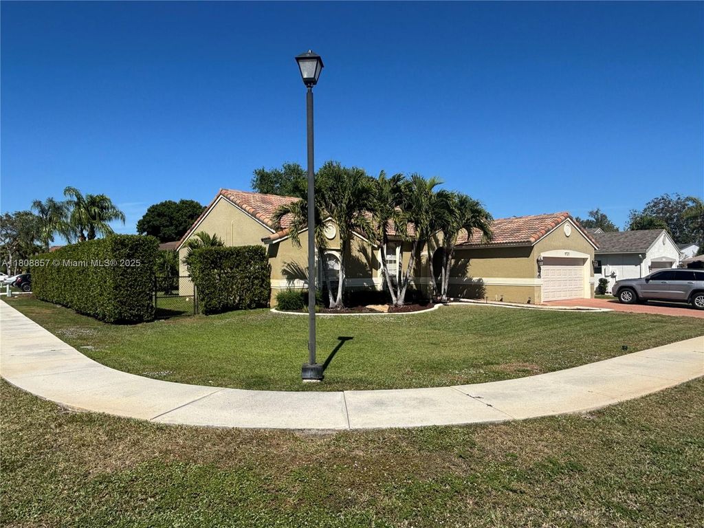 Photo of 9721 SW 15th Dr, Davie, FL 33324 (MLS # A11808857)