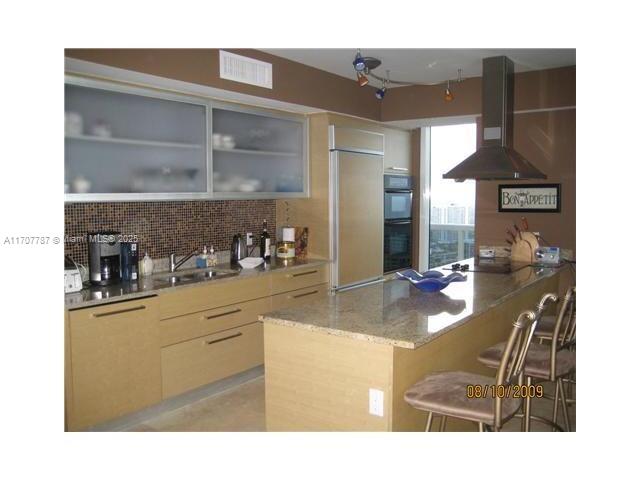 The BEST asking price for the LARGEST corner unit with the wrap around balcony. Breathtaking ocean views await you from 3 bedrooms 3.5 bathrooms with marble floors throughout. Large living room with open kitchen featuring high-end appliances. Blackout in the bedrooms. LG washer/dryer. 5 stars complex featuring 40,000 s.f. gym and spa, yoga, Latin dance and many others free classes. Concierge service, valet parking and security. UNFURNISHED. The pictures are outdated. The unit was repainted in light color. Tenant occupied. Unit can become vacant on 60 days notice.