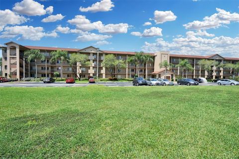 Photo of 13800 SW 14th St #409C, Pembroke Pines, FL 33027 (MLS # A11888244)