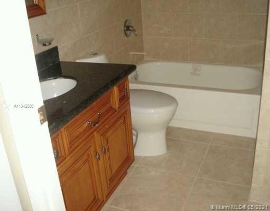 Nice updated one bedroom villa townhouse. turn Key ready to move. Corner unit with ceramic and parquet floor. kitchen with granite countertop. Large Laundry room with washer and dryer and heater. Additional attic space.