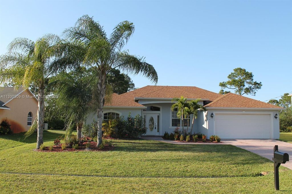 Photo of 2133 SW Alloway Ave, Port Saint Lucie, FL 34953 (MLS # A11330309)