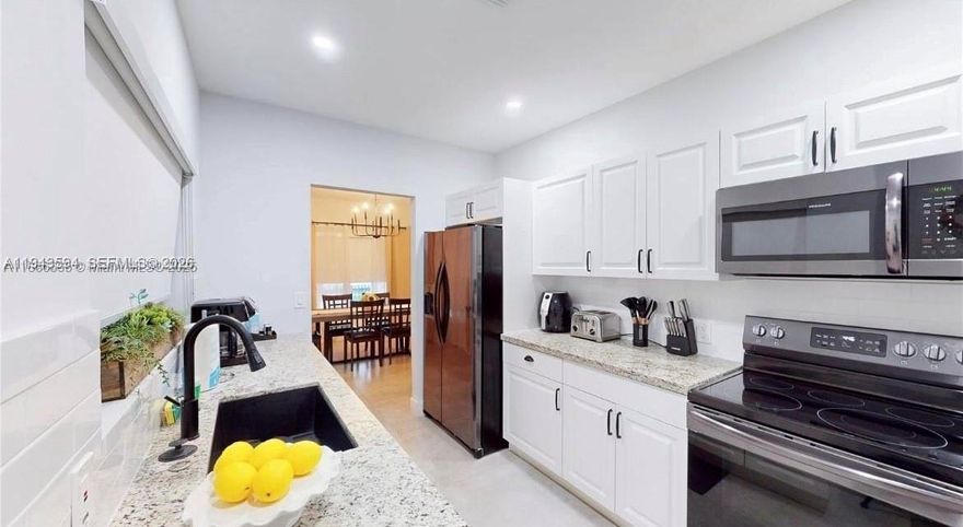 Fully furnished 4-bedroom, 3-bathroom home, including a detached bedroom unit as part of the total bedroom count. The property offers a functional layout with spacious living areas, abundant natural light, and laundry inside. Ideal for families, extended households, or roommates seeking flexible living space. Enjoy a private fenced yard and a central location just minutes from Wynwood, Design District, Midtown, Downtown Miami, major highways, shopping, dining, and public transportation. Move-in ready and available for immediate occupancy.