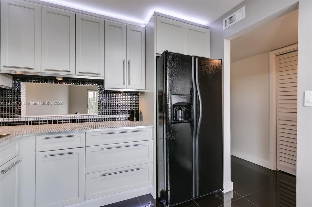 Photo of 5100 Washington St #303, Hollywood, FL 33021 (MLS # A11428981)