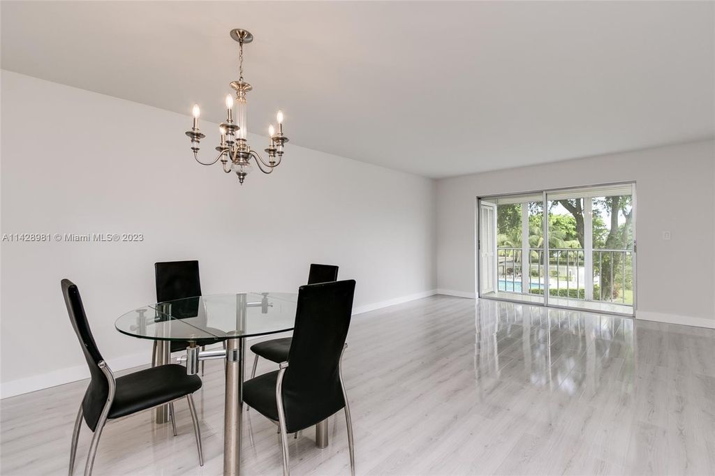 Photo of 5100 Washington St #303, Hollywood, FL 33021 (MLS # A11428981)