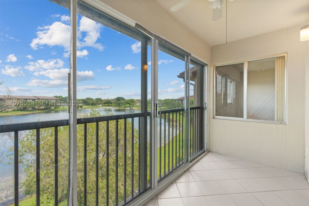 Photo of 13705 SW 12th St #409B, Pembroke Pines, FL 33027 (MLS # A12078014)