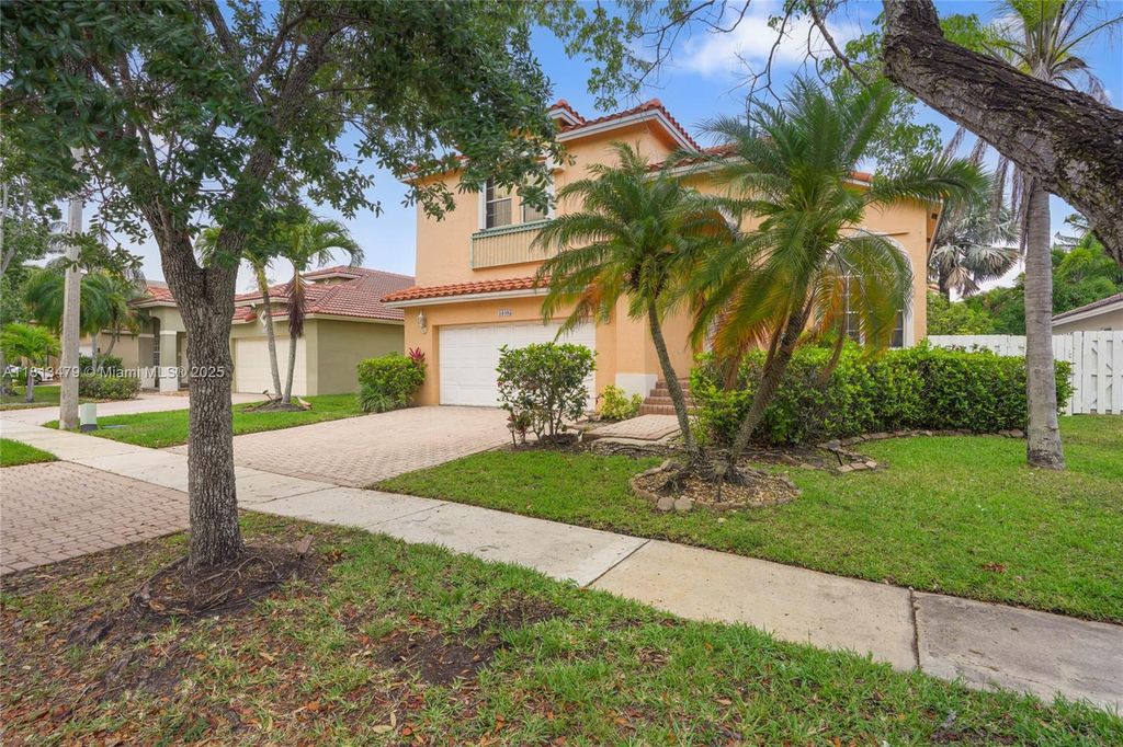 Photo of 18405 NW 9th Ct, Pembroke Pines, FL 33029 (MLS # A11813479)