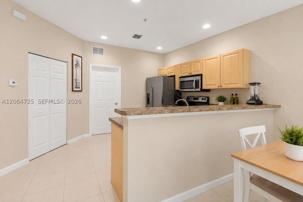 Photo of 1993 Marsh Harbor Dr, Riviera Beach, FL 33404 (MLS # A12064725)
