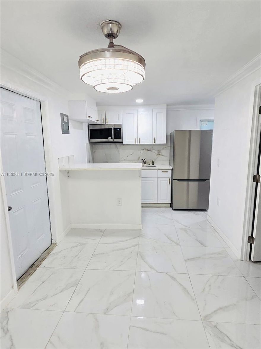 Move-In Requirements 2 months' rent required to move with rapid approval. Beautiful spacious bright 1 bedroom 1 bath single family home with private entrance and backyard. Freshly painted, new marble floors, new stainless-steel appliances, nice closets. Close to everything, major highways, shopping centers, Ste Rd. 7, minutes from the beach and more. Rental application, proof of income, Background & Credit reports. Additional Info: TOUR by appointment only. FPL, WATER, SEWER TRASH INCLUDE