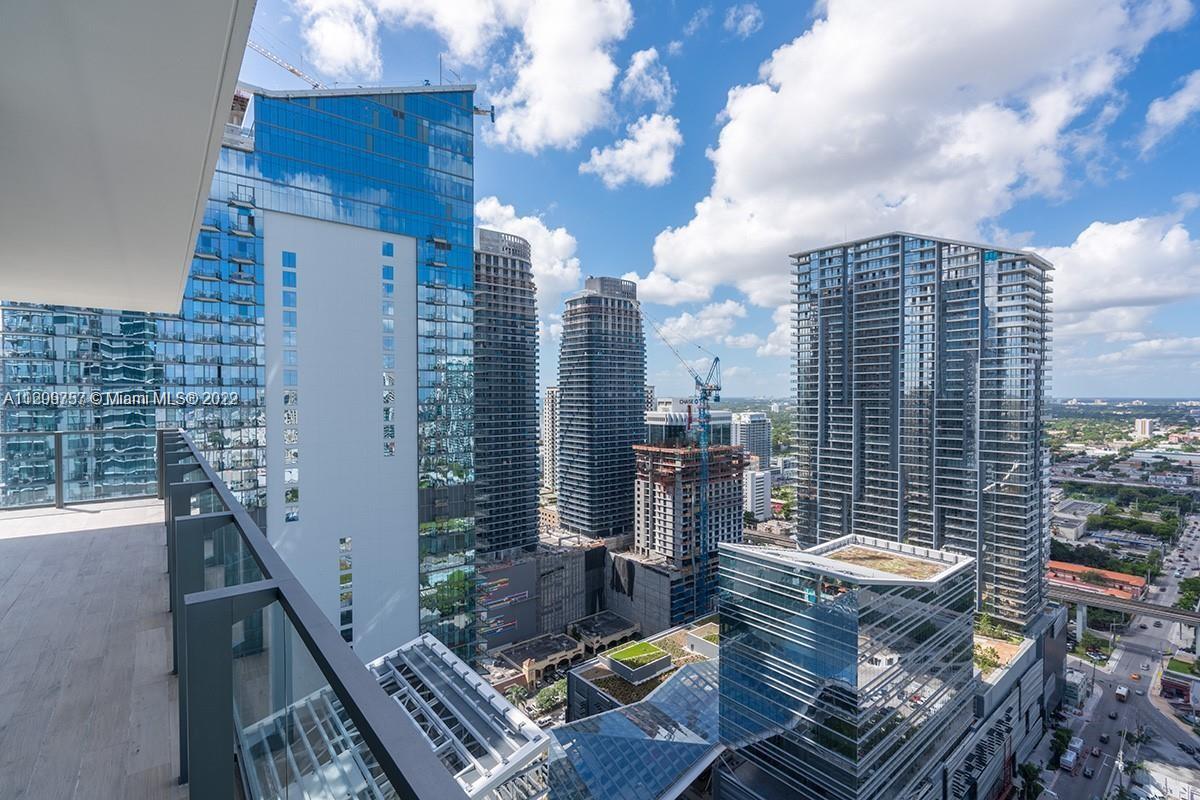 BEAUTIFUL SOUTH WEST VIEWS from this SPACIOUS 2 bedrooms 2.5 Bathrooms CORNER UNIT at REACH. Modern, grey marble floors throughout, custom closets, custom windows treatments, nice details, assigned parking space, cable and internet service included. Reach combines it all: perfect location, great amenities and services. Pets are not allowed
