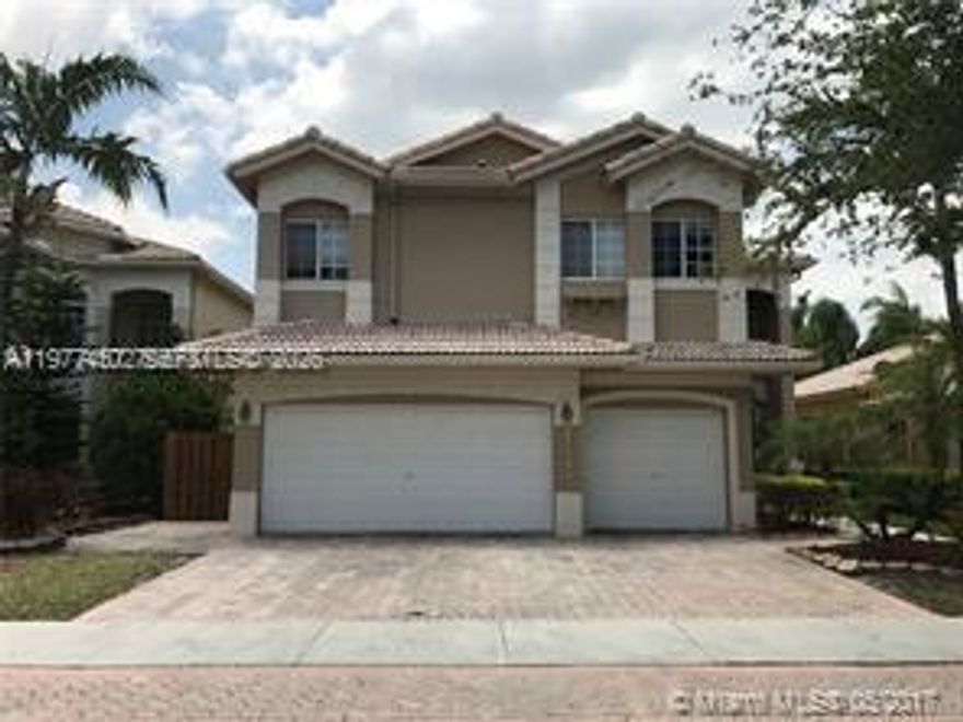 Beautiful two-story home located in the prestigious community of Doral Isles. This residence features a formal living room and formal dining room, an updated kitchen, and a custom-made staircase. The home offers 5 bedrooms and 3 bathrooms, including an oversized primary suite with a spacious bathroom featuring a Roman tub, separate shower, bidet, and double sinks. Additional highlights include a comfortable family room, a laundry room with washer and dryer, and a three-car garage. The large backyard is perfect for entertaining.
