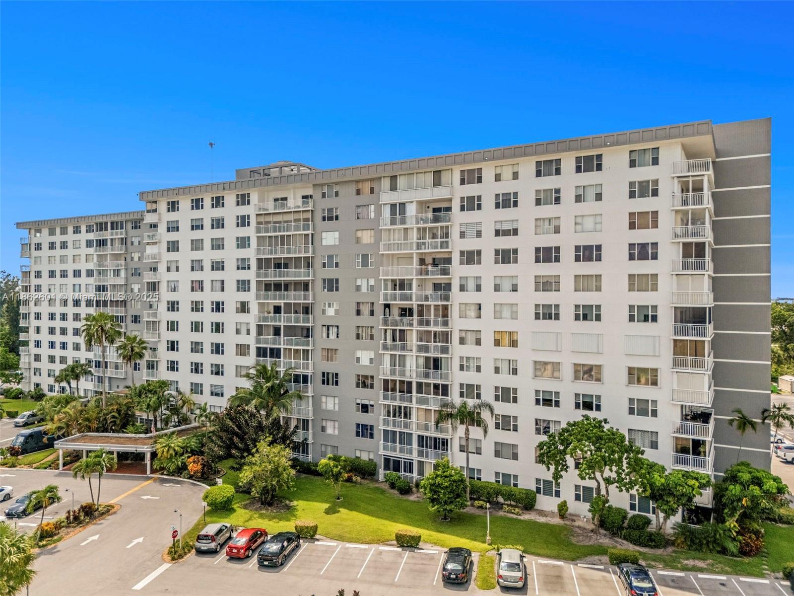 Beautifully updated 2-bed, 2-bath condo in an all-ages, FHA-approved community. Features include a modern kitchen with granite countertops, stainless steel appliances, and custom cabinetry. The open living and dining area flows to an enclosed balcony with serene garden and pool views, ideal for relaxing or entertaining. Spacious bedrooms offer ample closets, while hurricane impact windows provide safety and efficiency. This move-in ready home comes with resort-style amenities: pool, clubhouse, fitness center, and scenic walking/dog trails right in the back. Perfectly located minutes from golf courses, beaches, shopping, and dining, this residence combines comfort, convenience, and the best of South Florida living.