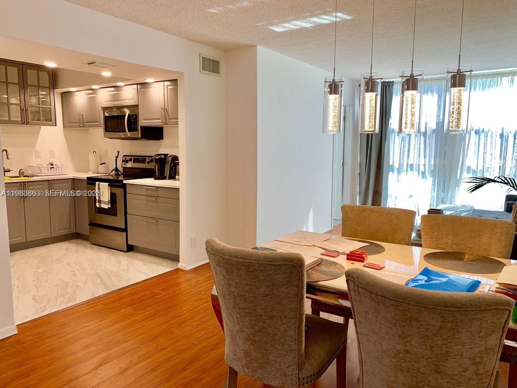 Photo of 851 Three Islands Blvd #308, Hallandale Beach, FL 33009 (MLS # A11980863)