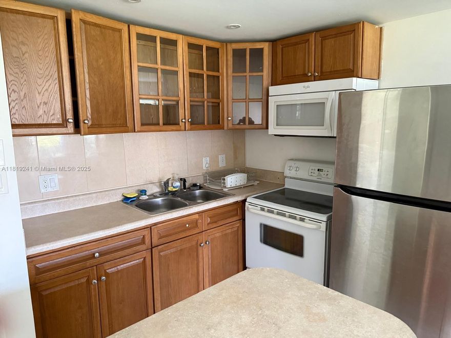 Beautiful Apartment located at first floor in the well known Century Village Condominium with all the amenities that they offer. The apartment is ready to move. With tiles floor, new AC & refrigerator, etc. Is a quite place to live with a pleasant neighborhood